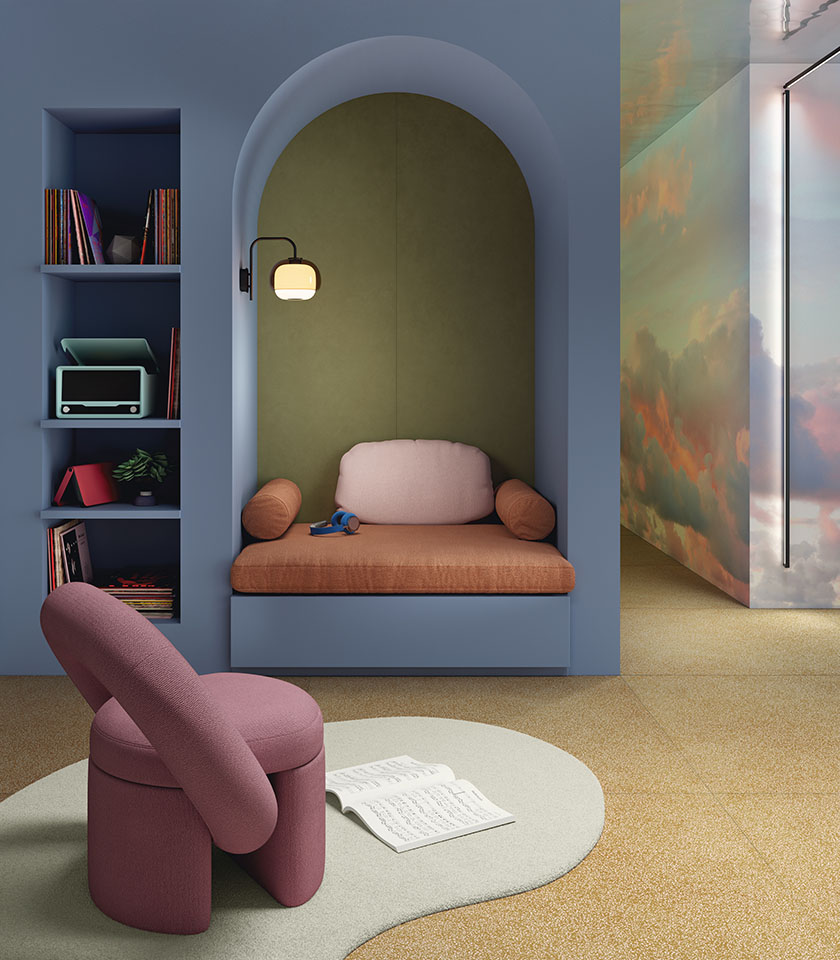 Contemporary relaxation corner with enveloping colours, textured surfaces and softly shaped furniture.