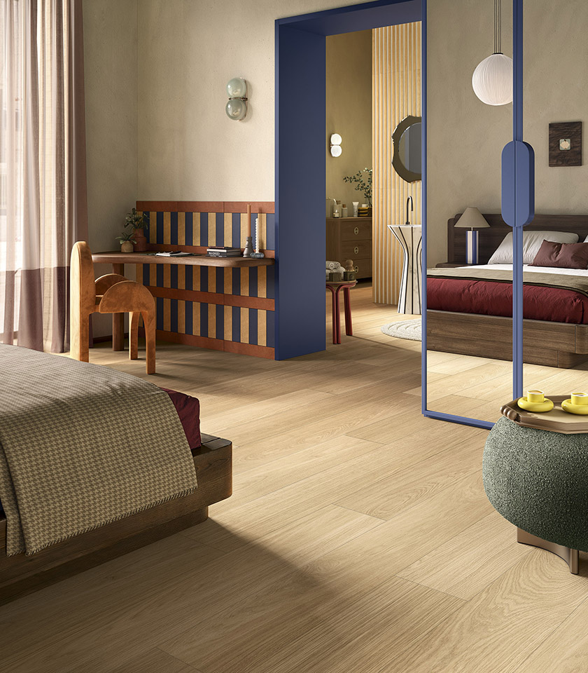 Bio Charme Golden captures the warmth of oak in a bright, natural-looking ceramic surface, ideal for welcoming bedrooms with a contemporary design.
