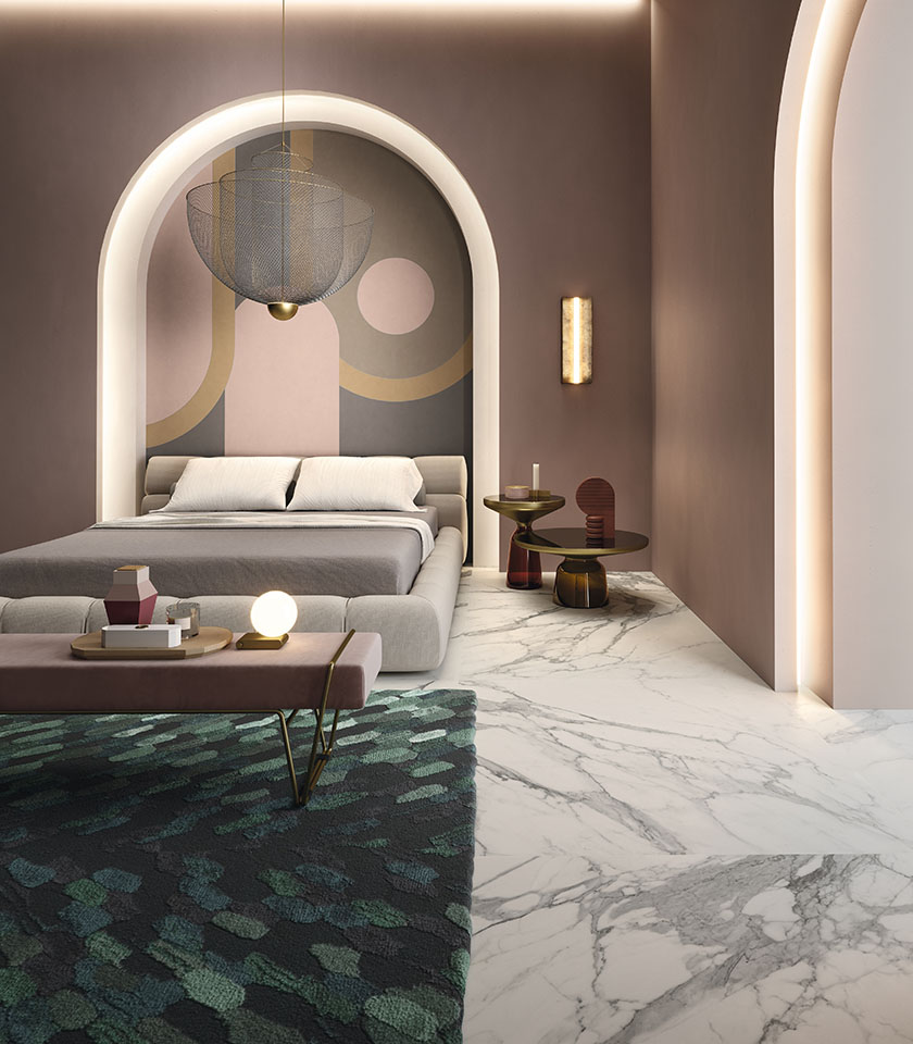 Noblesse Pure Statuario brings bright, sophisticated elegance to the bedroom, with marble-effect surfaces that enhance the space with natural refinement.