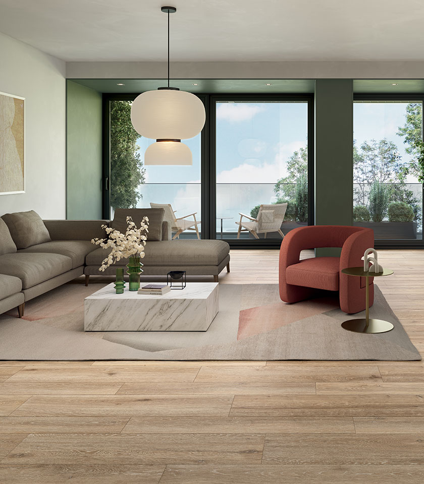 Contemporary living room with flooring from the Bio Attitude collection in Amber wood effect.