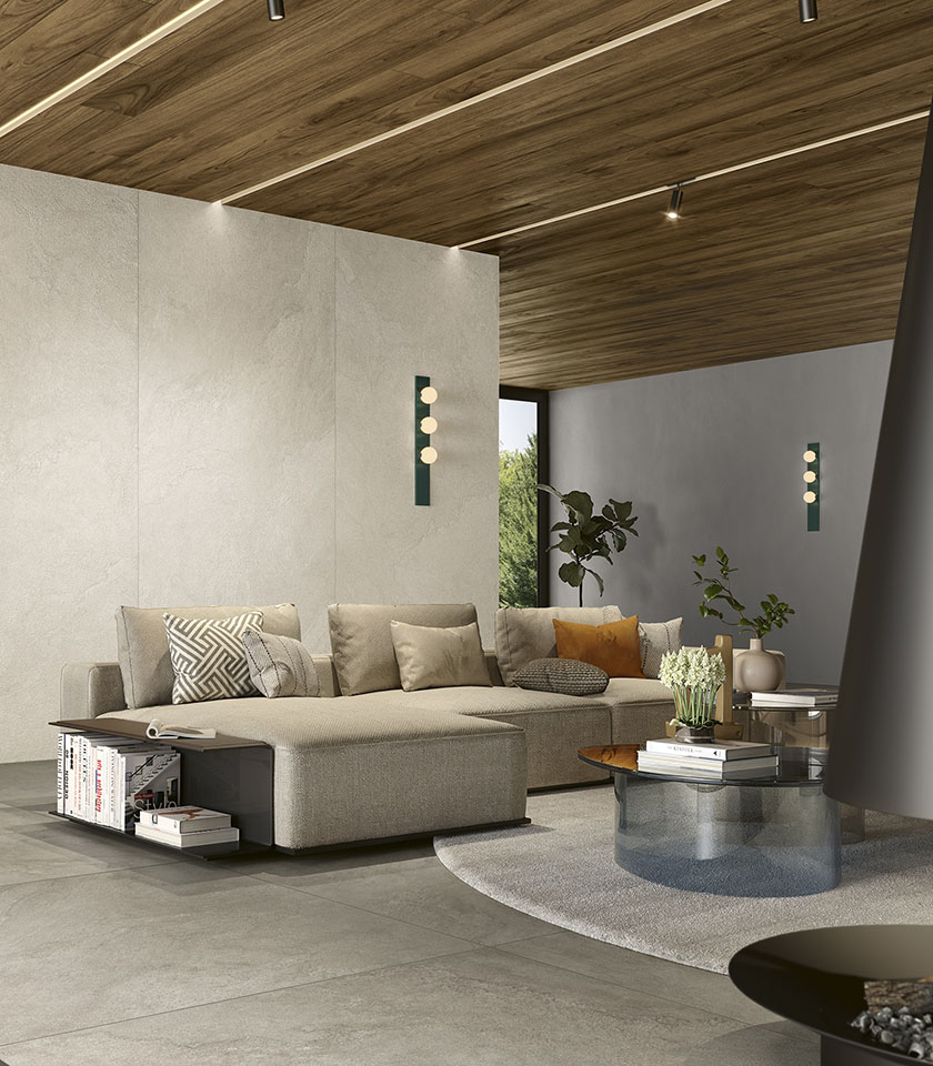 Discover ideas for a modern living room with a refined material look, featuring Lea Ceramiche surfaces that blend contemporary elegance, comfort and distinctive design.