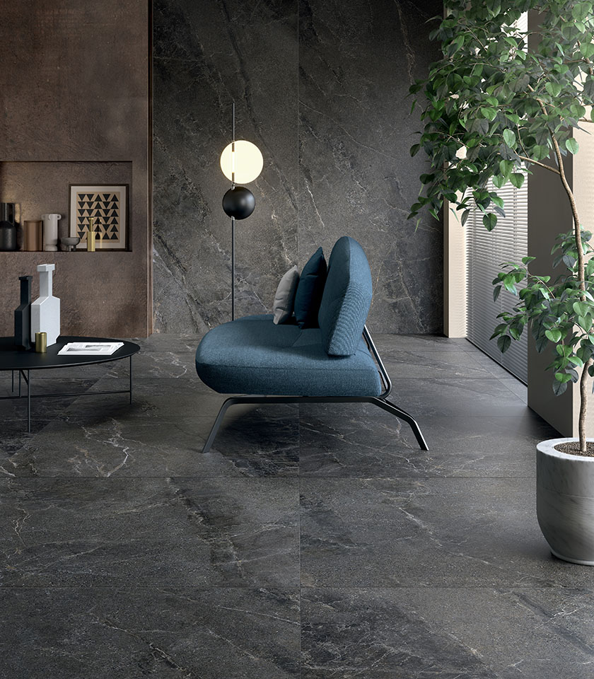 Discover modern living room ideas with Lea Ceramiche stone-effect surfaces, designed to create elegant, textured interiors with strong visual impact.