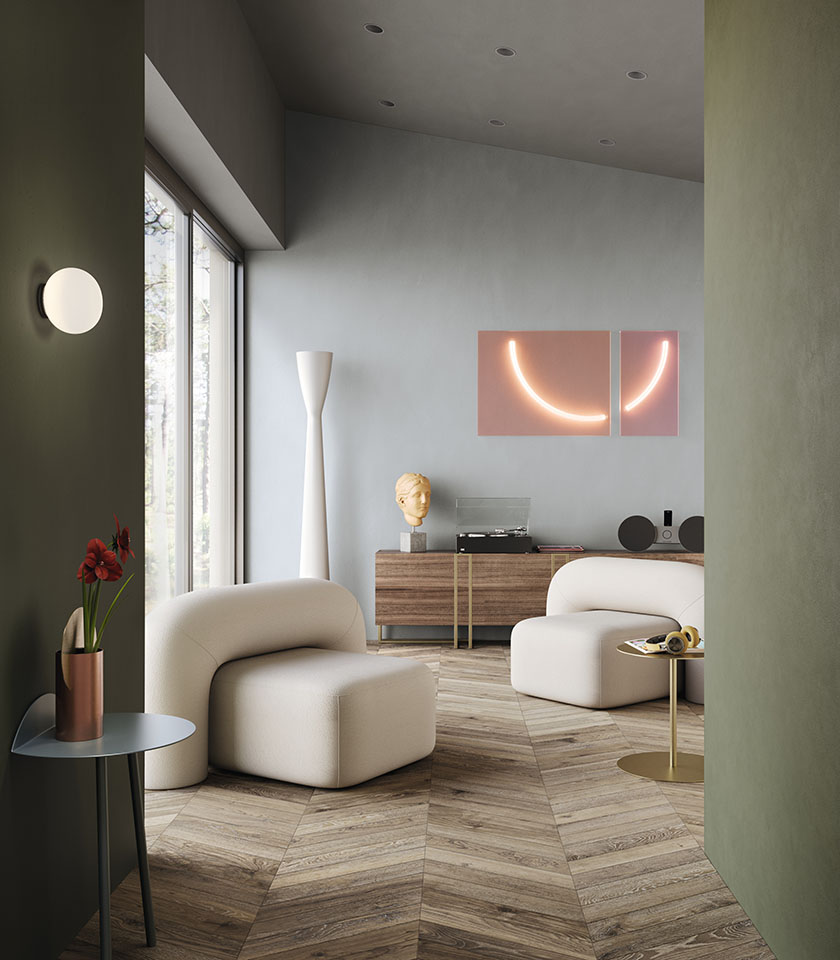 Discover modern living room ideas with Lea Ceramiche wood-effect surfaces, combining natural warmth, contemporary design and refined color contrasts.