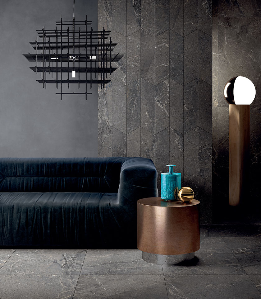 Discover ton sur ton with Lea Ceramiche stone-effect surfaces in dark shades, creating sophisticated, immersive interiors with a bold character.