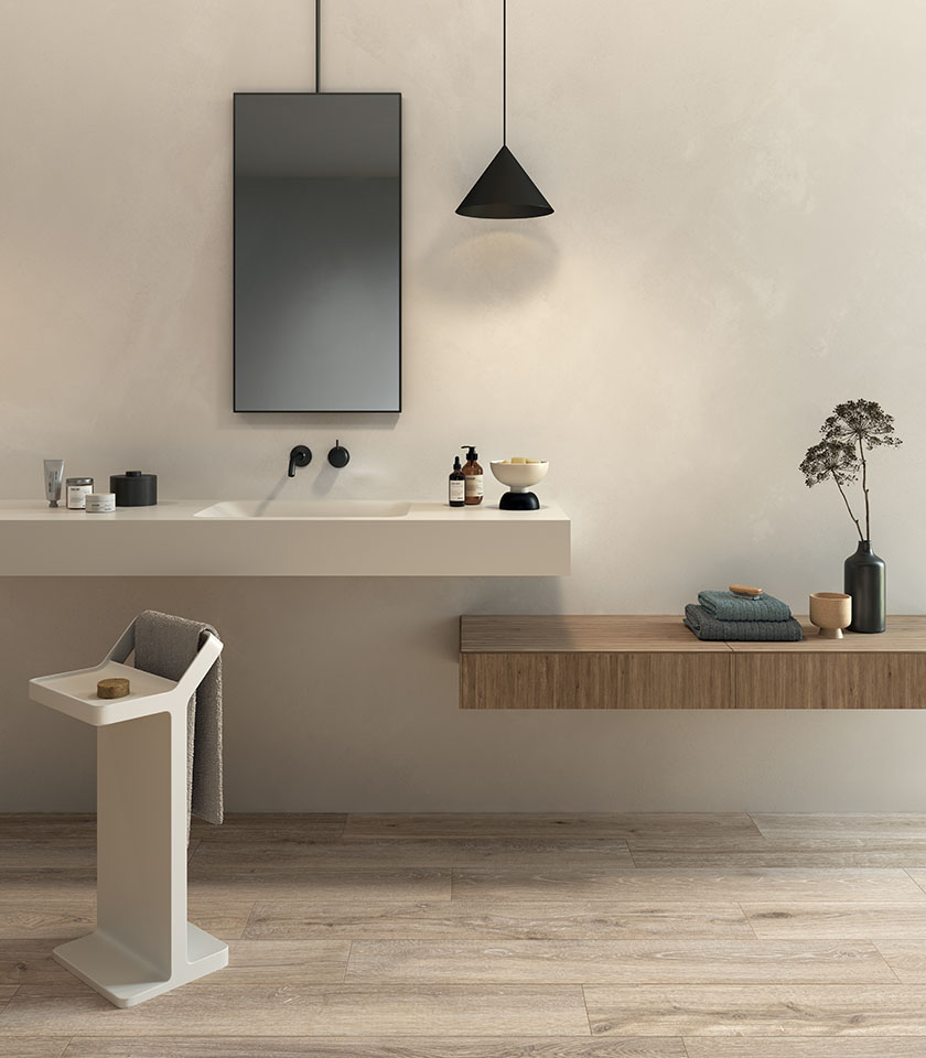 Minimalist bathroom with light wood-effect flooring, floating furniture and neutral tones for a clean, bright and relaxing atmosphere.